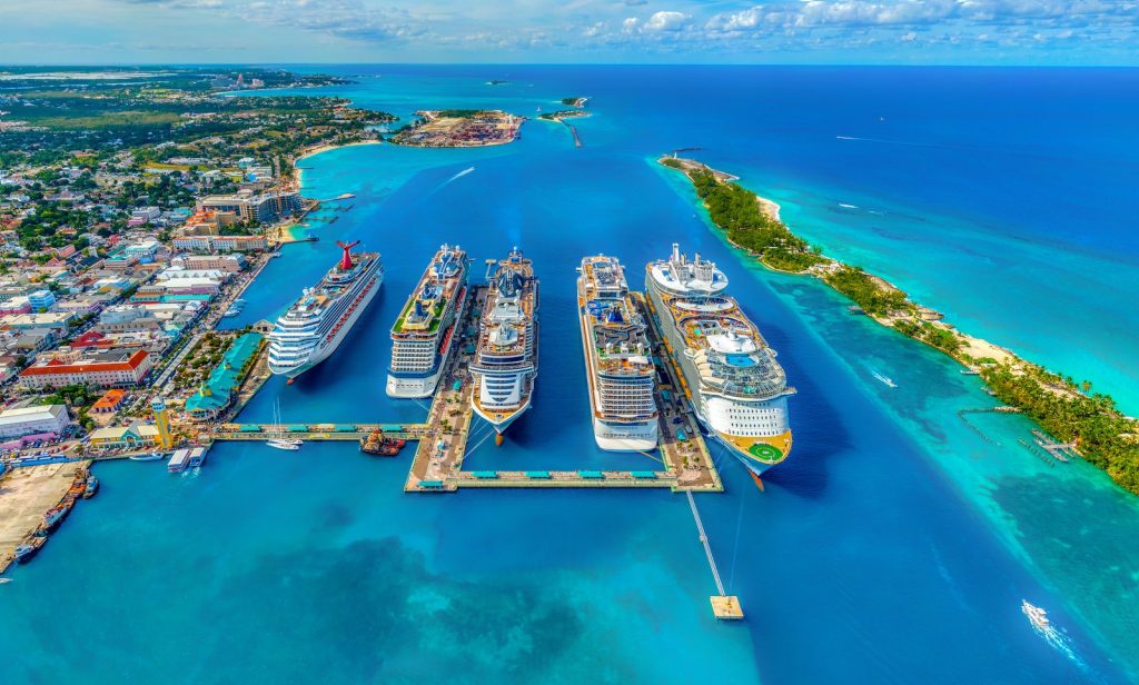 aerial photography of white and blue cruise ships during daytime in The Bahamas