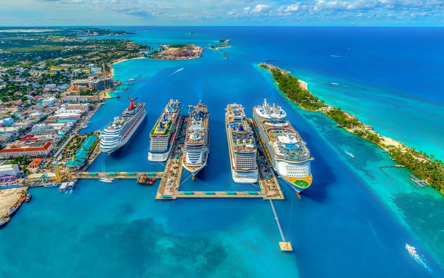 aerial photography of white and blue cruise ships during daytime