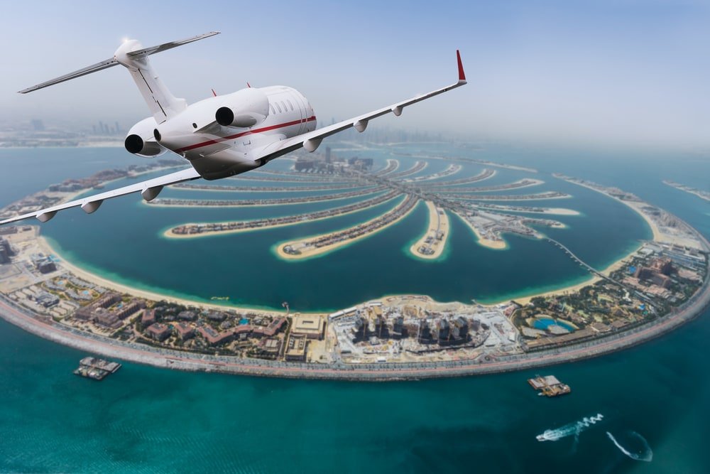 Dubai Palm artificial Island with private jet — Photo