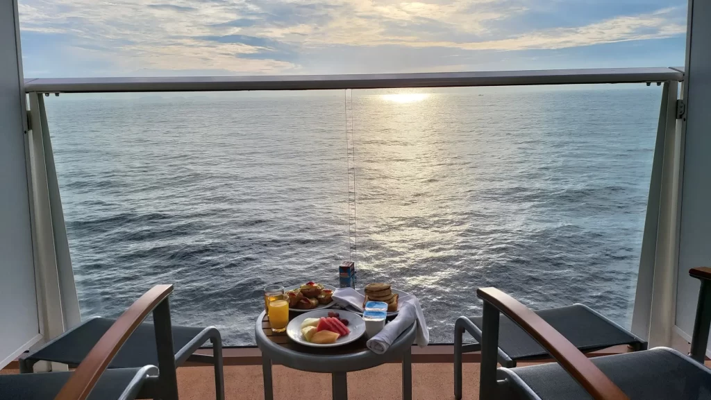 Experience the ultimate luxury of starting your day with a delectable breakfast spread on the private balcony of a Caribbean cruise ship. Take in breathtaking ocean views as you indulge in a sumptuous meal,